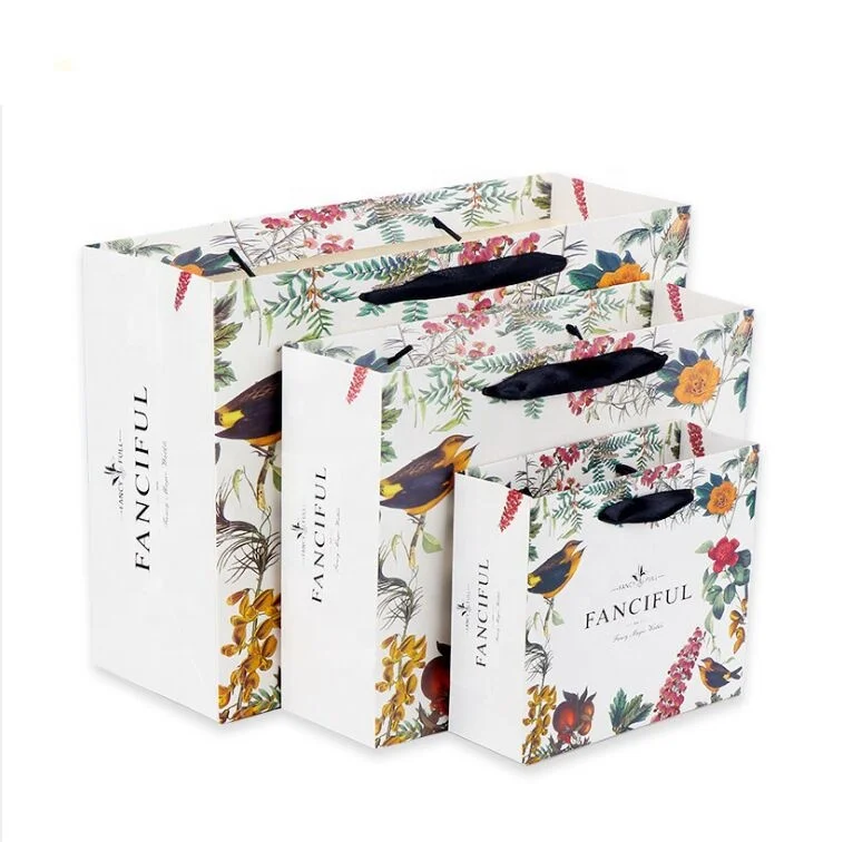 Wholesale custom printed luxury shopping gift paper bag with handle