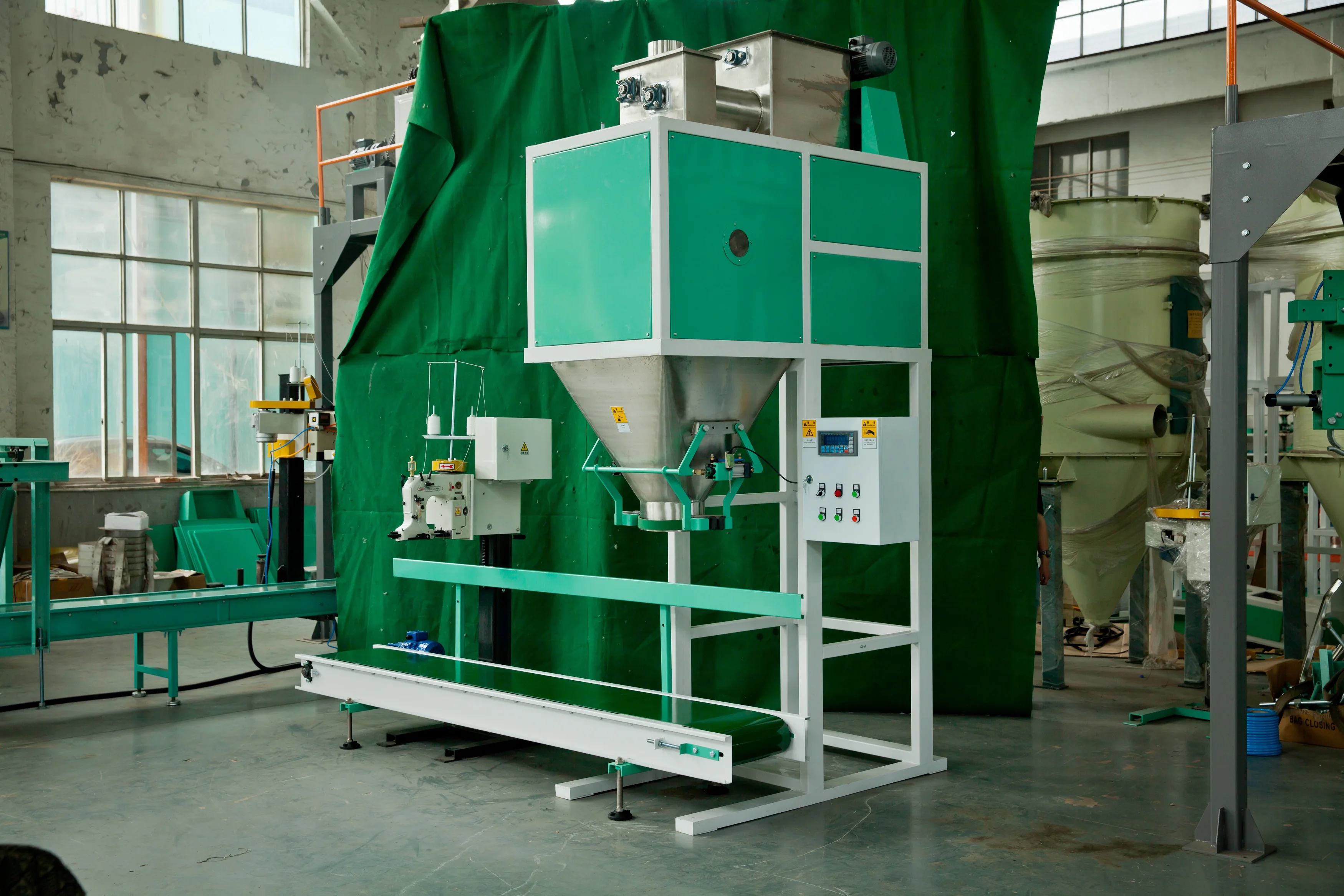 Bag infeed system Tag dispenser Sewing line with synchronized bag top chain conveyor premade tag application device