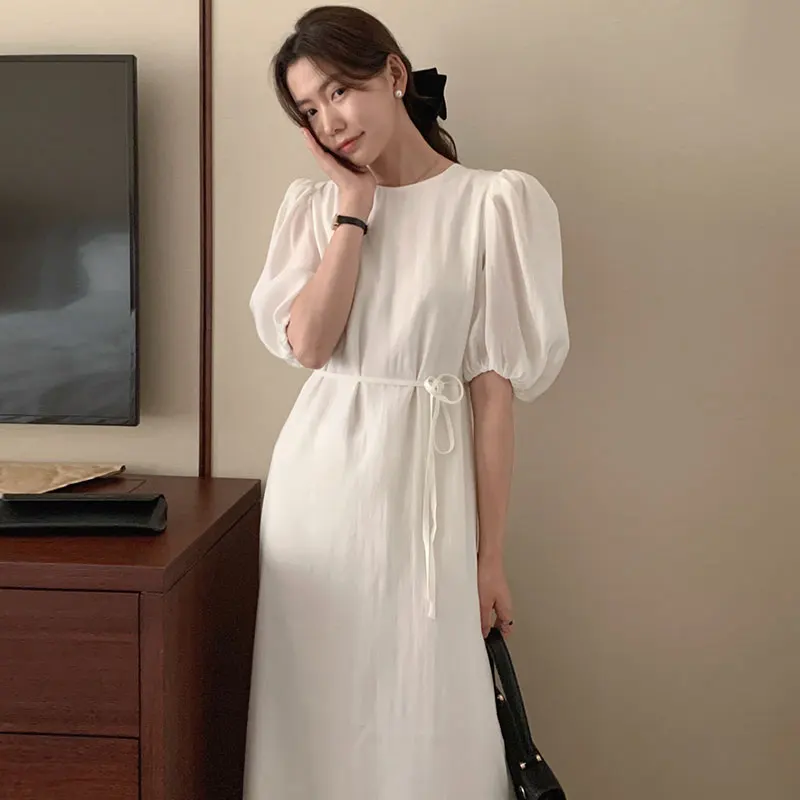 Wholesale 2023 South Korea Soft Green Round Neck Hollow-out Backless Lace Up Waist Solid Color Bubble Sleeve Dress