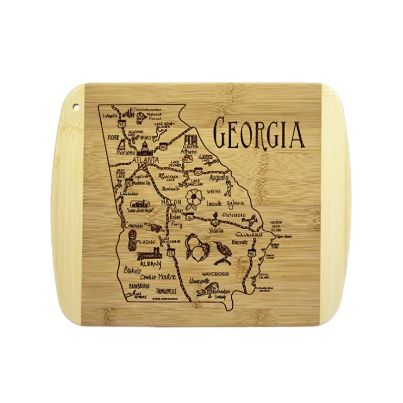 A bamboo cutting board with a laser pattern on a Georgia city