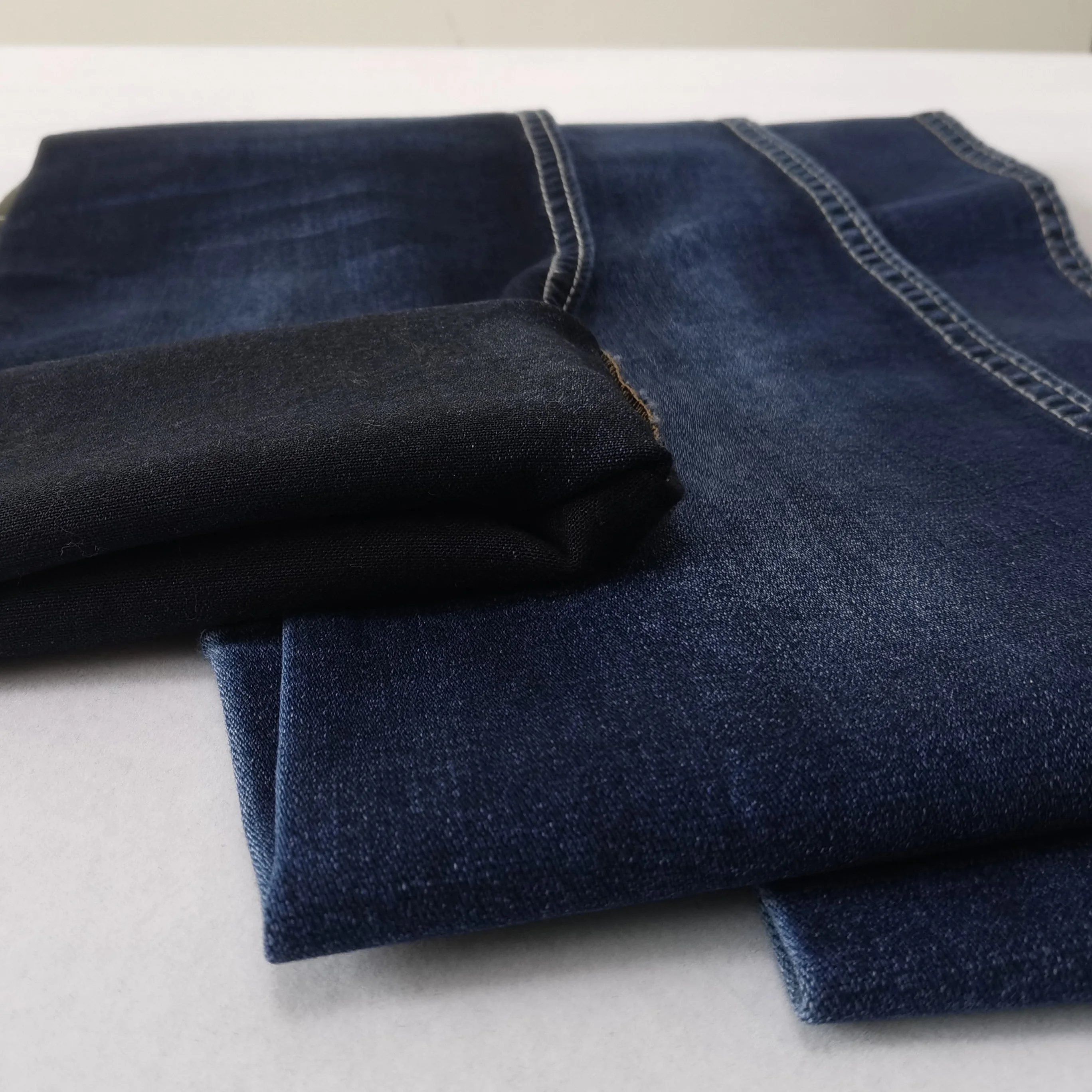 High quality good stretch 10 oz tencel American design netting weaving new development denim fabric