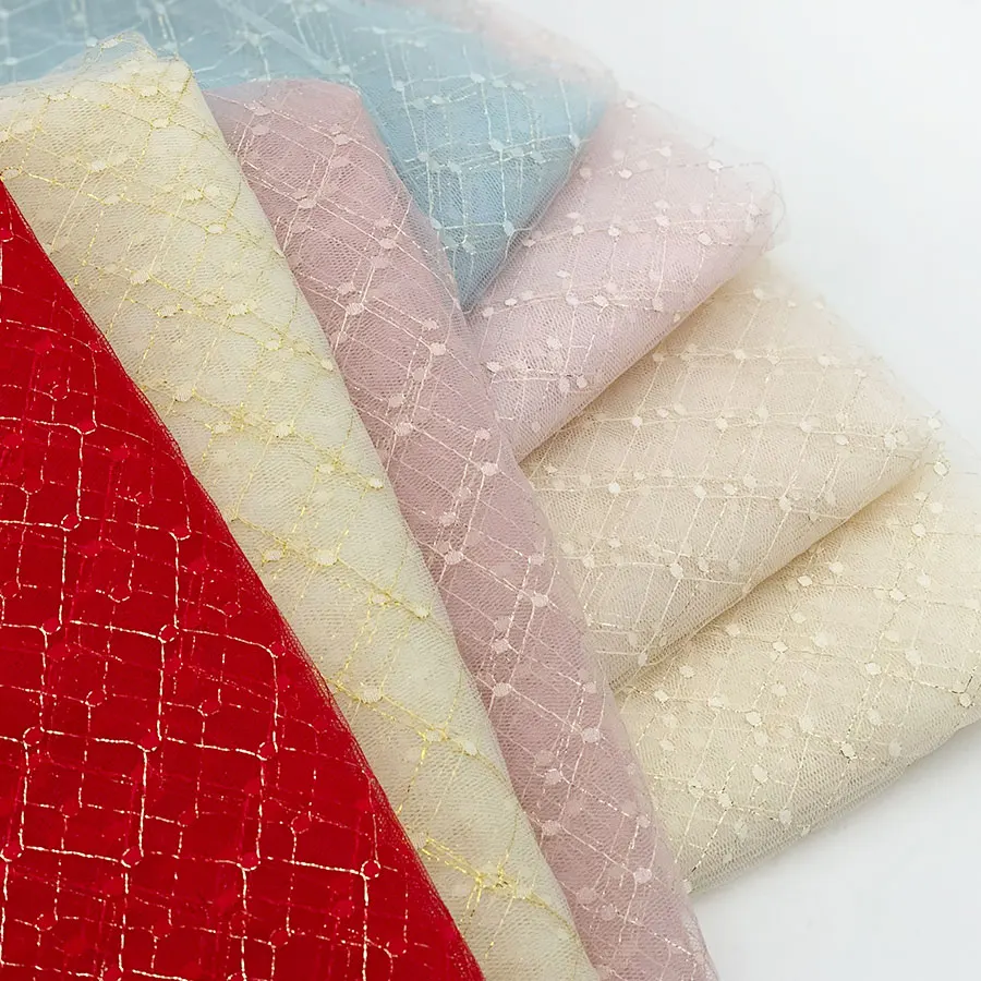 The high quantity women rhombus soft jacquard transparent gold nylon fiber mesh knit tulle fabric for clothing sleeves