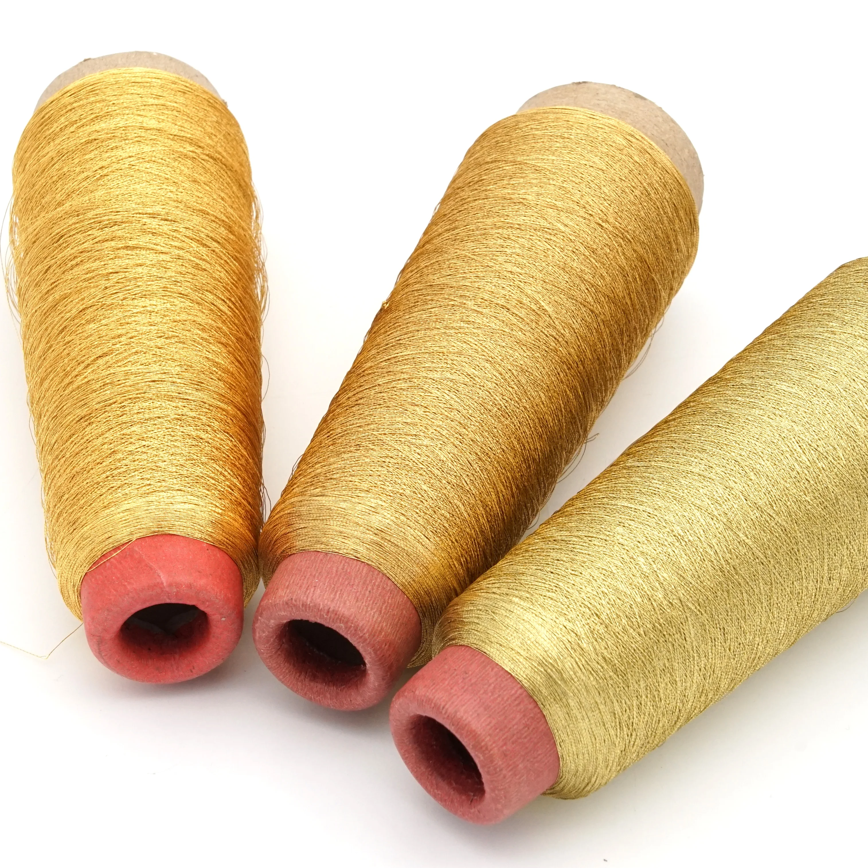 Round yarn real silver metallized surface gold on a cone 3200 Meter metallic spools gold yarn for Embroidery