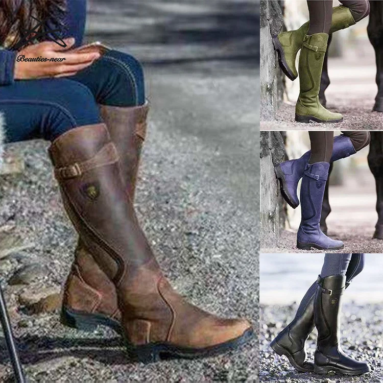 Женские кожаные сапоги до колена на массивном каблуке