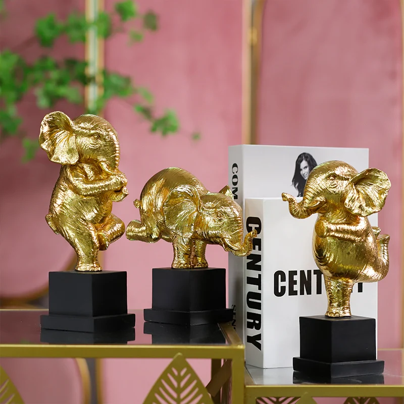 Redeco Classic Luxury Elephants Statue Gold Color Figure Resin Animal Crafts for Home Office Tabletop Decoration