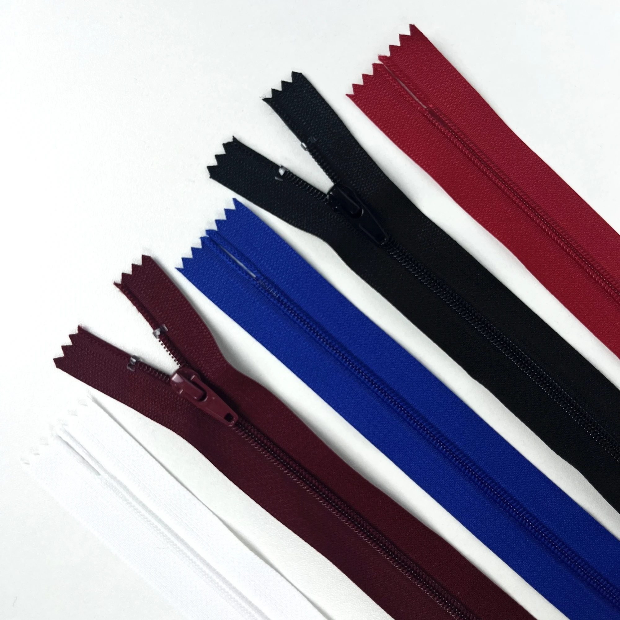 Jinhua Yiwu decorative metal invisible plastic zip custom logo close end nylon zipper pulls cursors sliders puller for bag