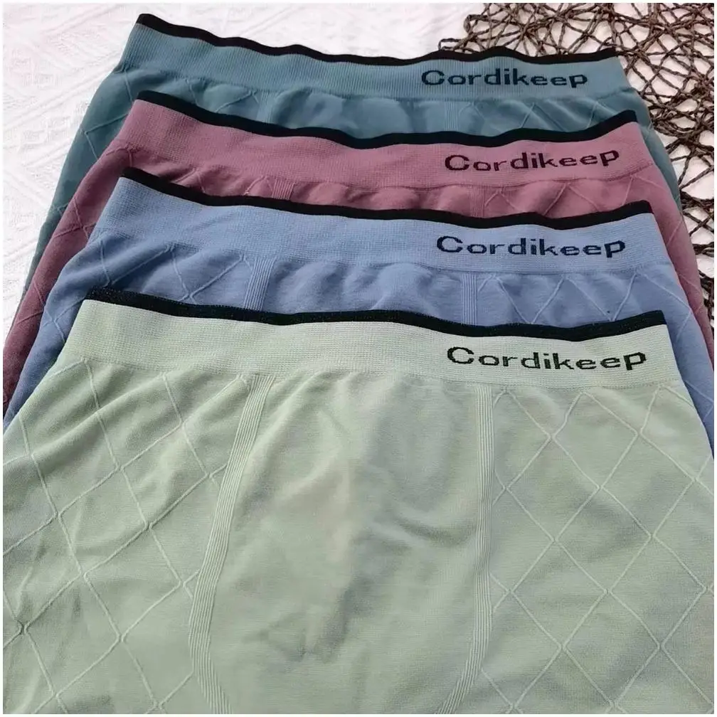 Mens Sexy Underwear Ball Pouch Ice Silk Wholesale Bikini Hot Sale Boy Photos Popular Polyester Thong Brief for Man Shipping Free