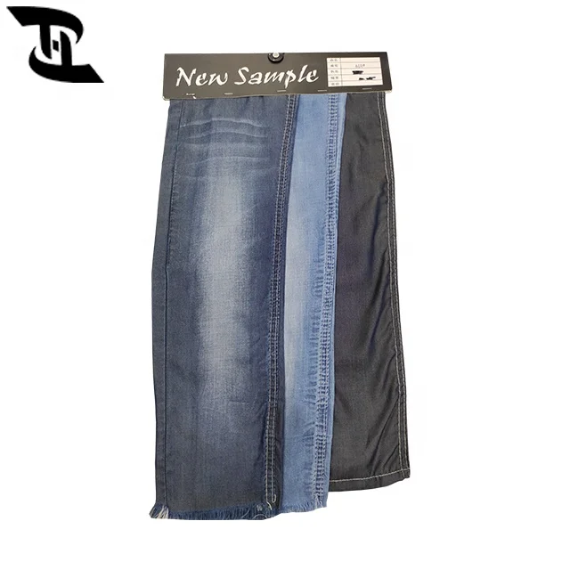 
Factory hot sell 5.2 OZ light weight dark blue TC denim jeans fabrics for shirts and pants 