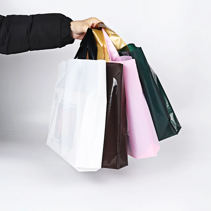 China Manufacture bags supplier pink plastic bags custom logo printing shopping bag with handle for clothing packaging