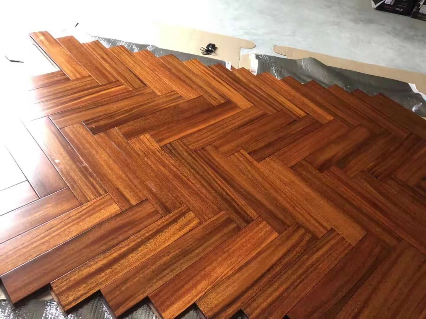 natural UV iroko herringbone parquet wood floor