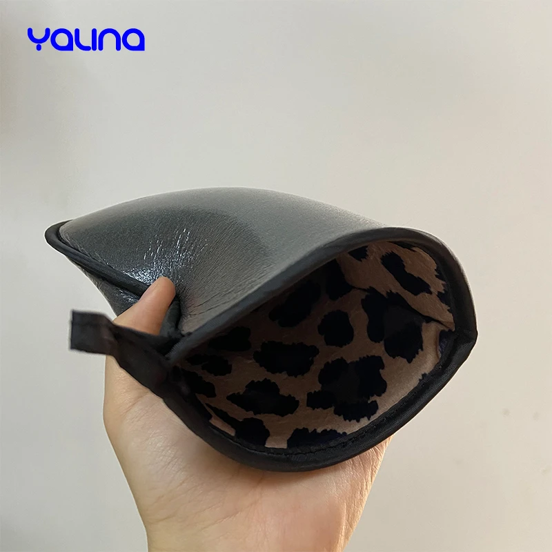 Reusable applicator glove evenly applies natural bronzed streak free appearance Leopard tanning mitt