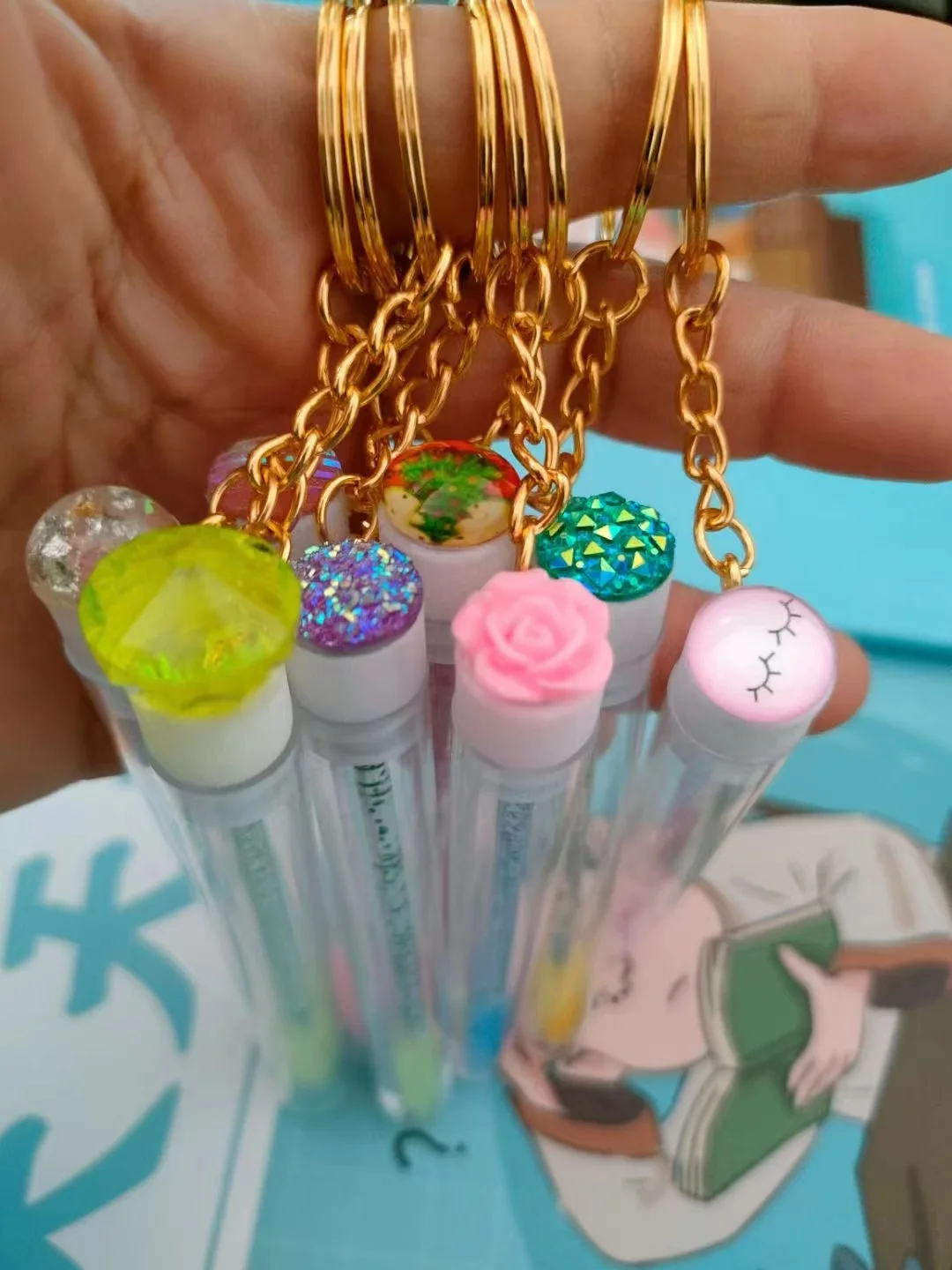 Wholesale OEM lash spoolie unique eyelash brush empty mascara tubes with brush keychain