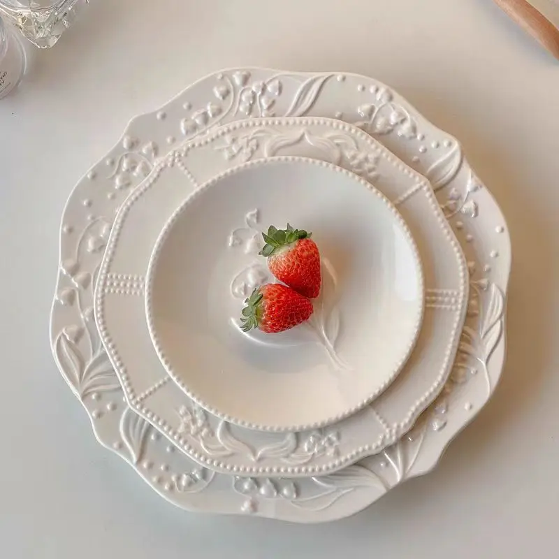 Wholesale Irregular Retro Handmade Glazed Three Dimensional Relief Bell Orchid Nordic Matte White Dessert Ceramic Dinner Plates