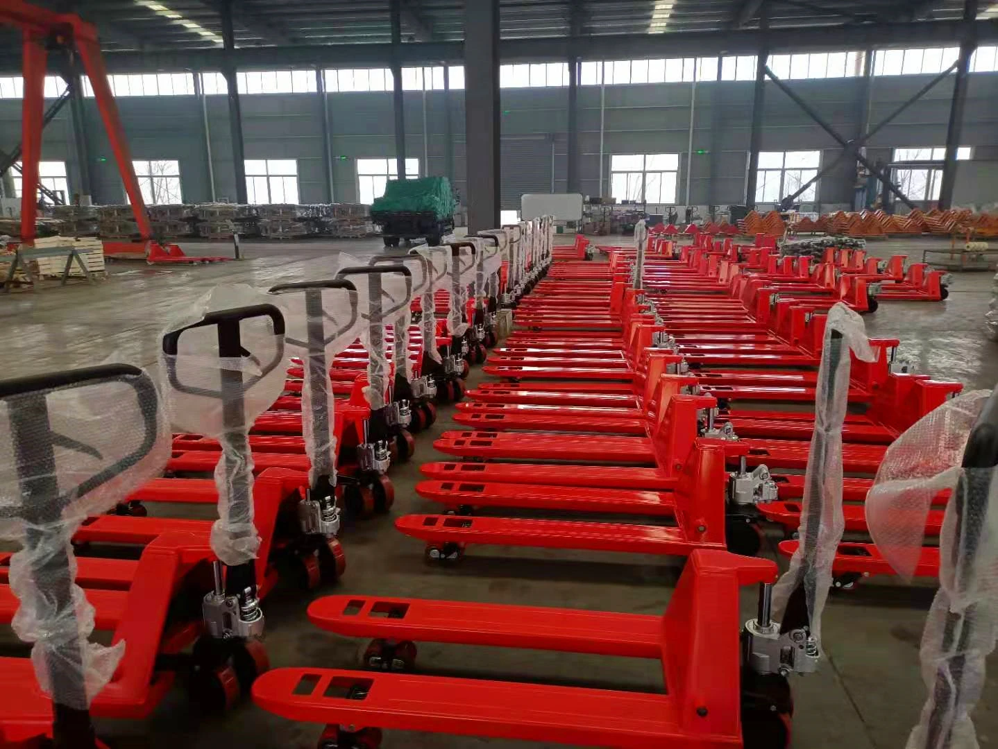 heavy duty lifter machine 3 tons hydraulic hand pallet truck rubber wheel China