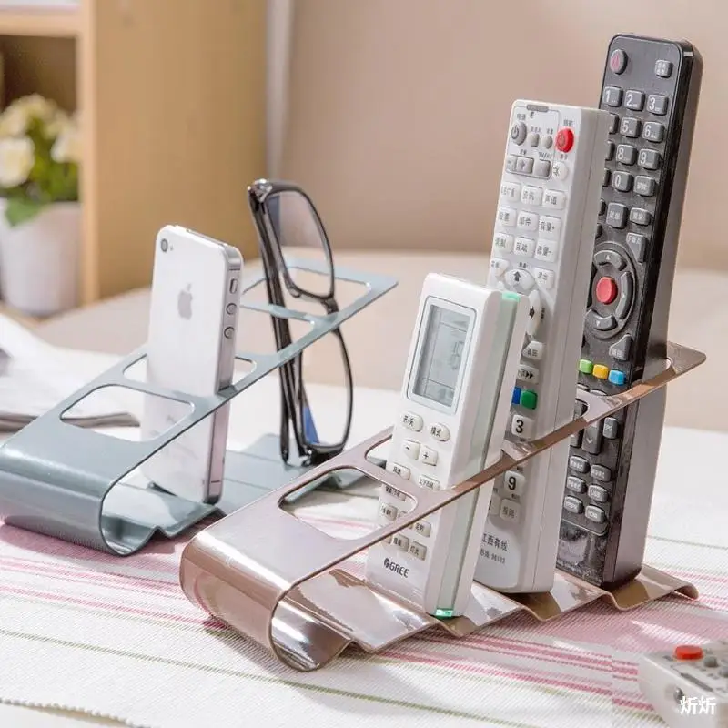 Creative four-compartment remote control storage rack office desktop