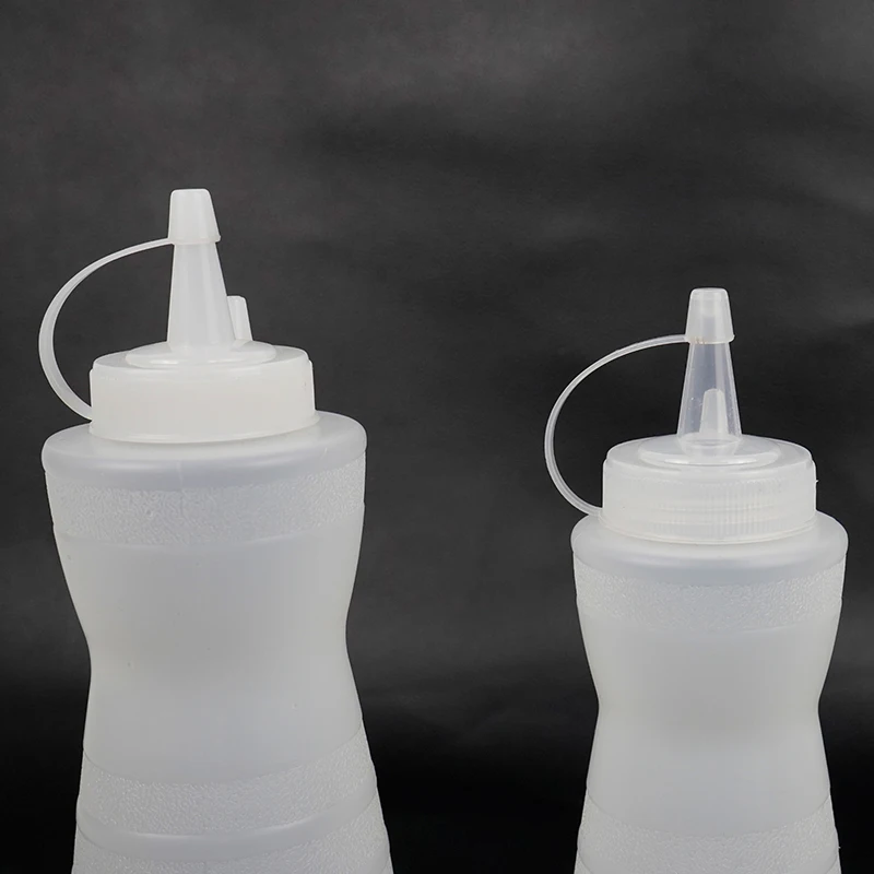 Manufacturer Plastic Thin Waist Squeeze Sauce Bottle Embossed Nozzle Squeeze Pot Jam Tomato Salad Bottle Squeeze Sauce Bottle