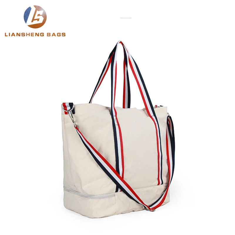 
Large canvas bag with separate layer of shoes and umbrellas underneath 