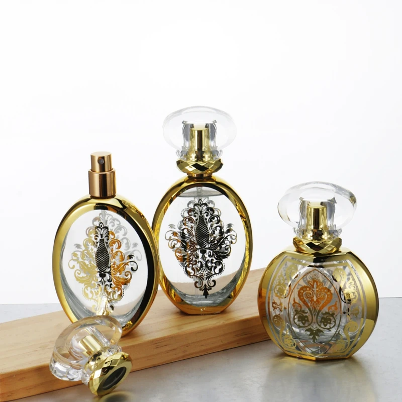 Factory Supply 50ml Arabic Pattern Flat Oval Classic Perfume Glass Packaging Fine Mist Perfume Spray Bottle with Luxury Lid