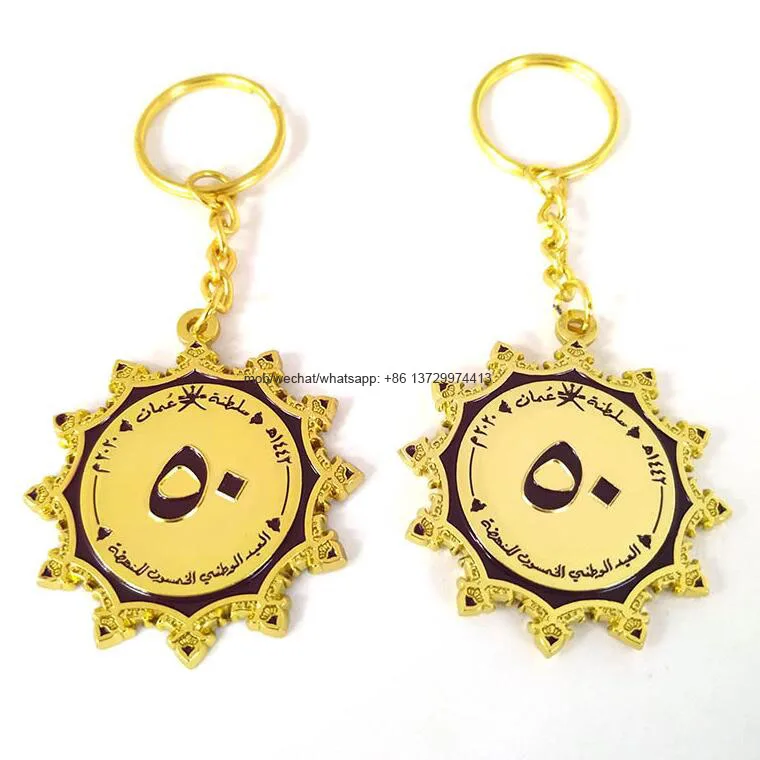 zinc alloy gold plated enamel souvenir key charm for Oman 52 national day celebration