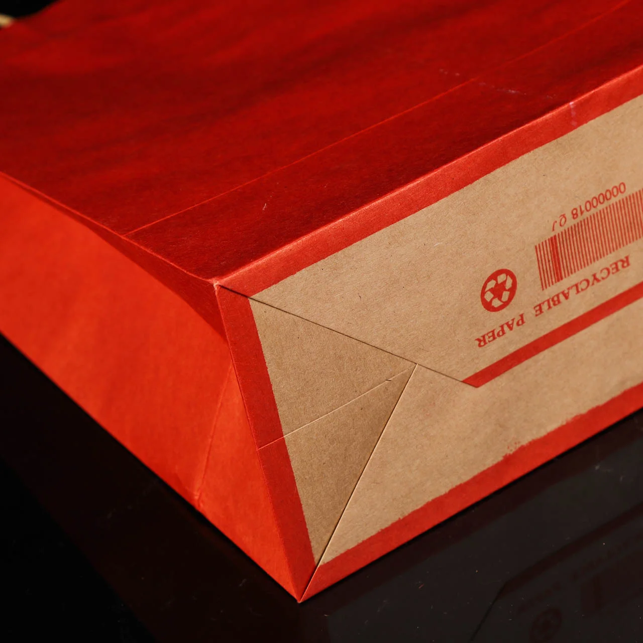 China Manufacturer wholesale custom logo kraft paper gift bag with rope handle