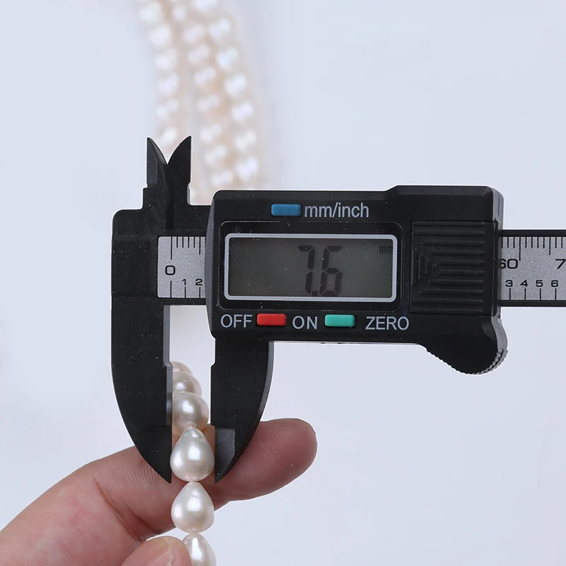 Wholesale 7-9/9-11/10-11mm White Color Drop Shape Baroque Natural Freshwater Pearl Strands