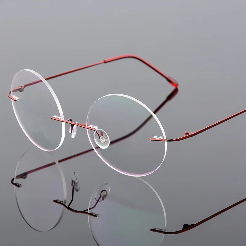 2024 New arrivals retro round rimless memory titanium flexible unisex eyeglasses fashion glasses men women