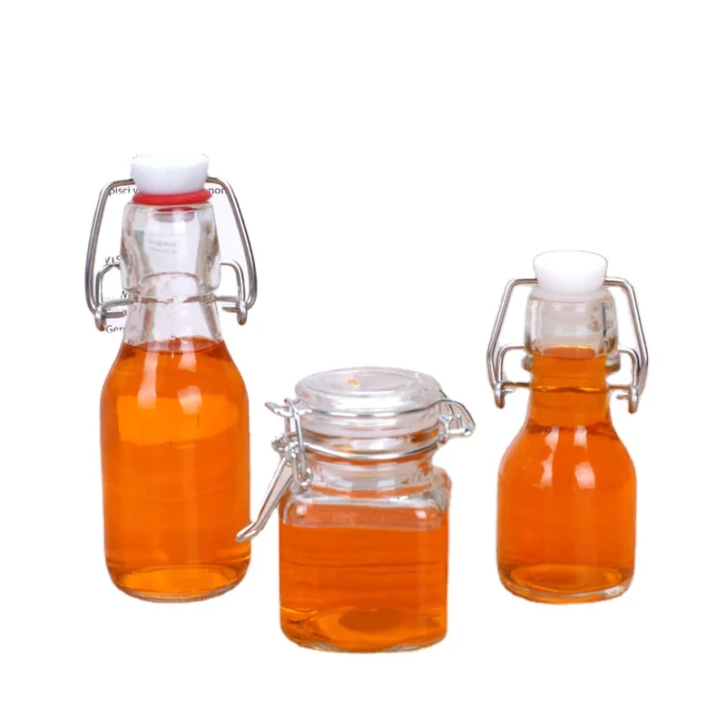 Прозрачная небольшая емкость стеклянная бутылка для пива напитков сока питьевой стакан с откидной крышкой