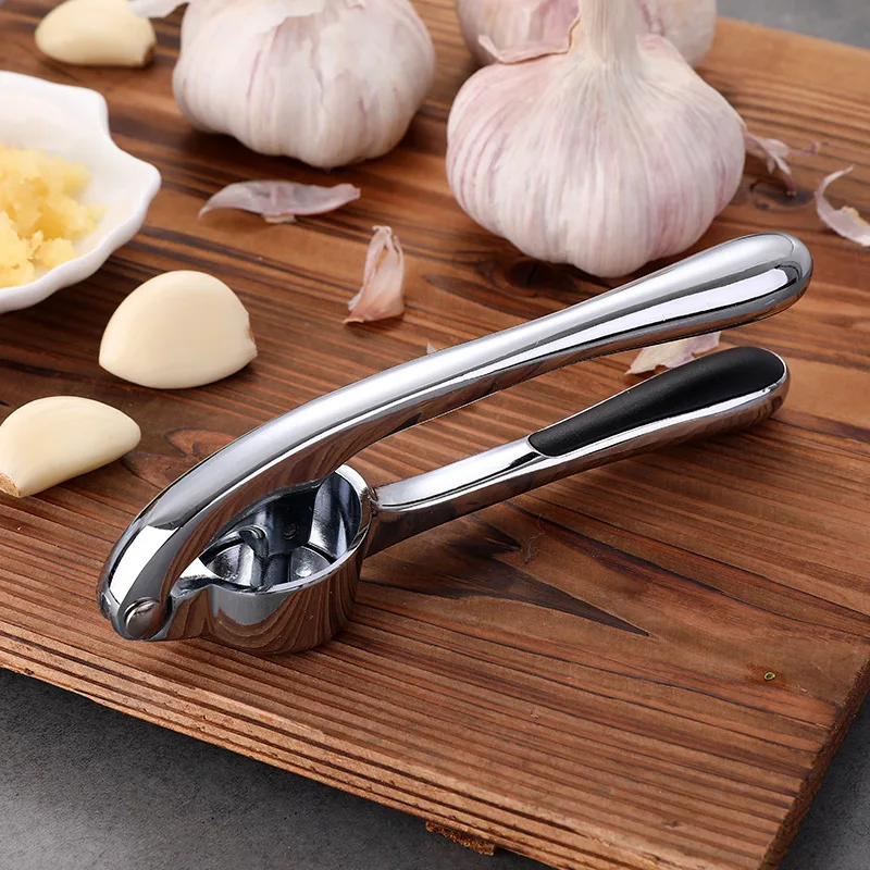 Wholesale Kitchen Gadget Zinc Alloy Metal Garlic Crusher with Stainless Steel Blade for Vegetable Preparation