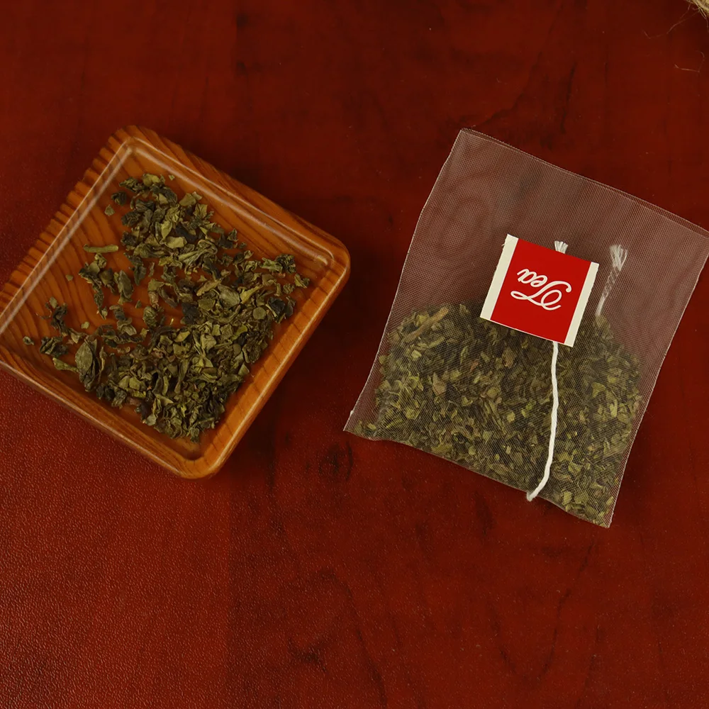 Высококачественный чайный пакетик, оптовая продажа, нейлоновый цветочный чайный пакетик, фильтровальная бумага, нейлоновый чайный пакетик в виде пирамиды, можно настроить