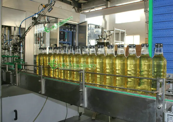 Automatic Rotary Type 0.5l-5l Pet Plastic Bottle Sun Flower Coconut Palm Oil Vinegar Filling Capping Labeling Packing Machine