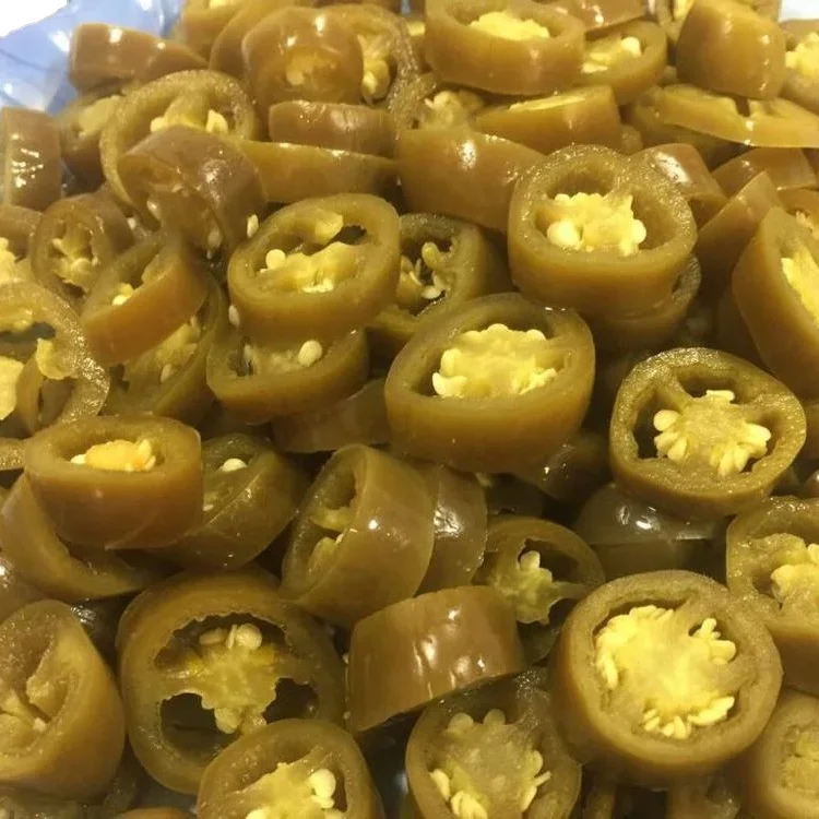Sliced Green Jalapeno pepper preserved in brine ready for eat as appetizer  made in Egypt all packages you need