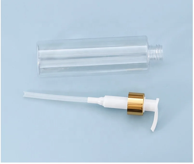 200mL pressure pump bottle. Transparent bottle body, white pump head, gold ring
