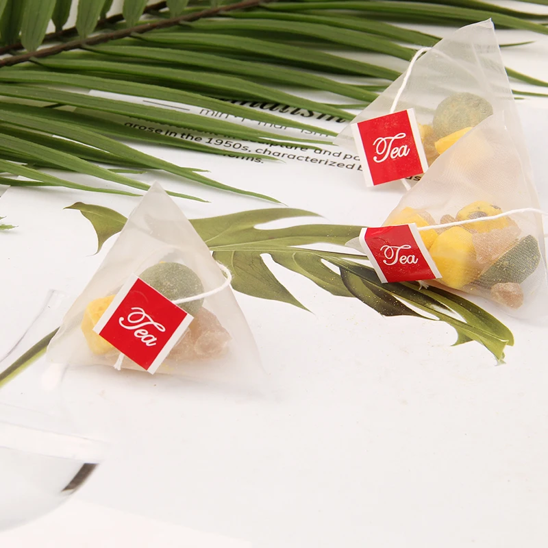 Wholesale Dried  Flavor Tea Pyramid Triangle Tea bag Mixed sweet fruit Kumquat Passion Tea