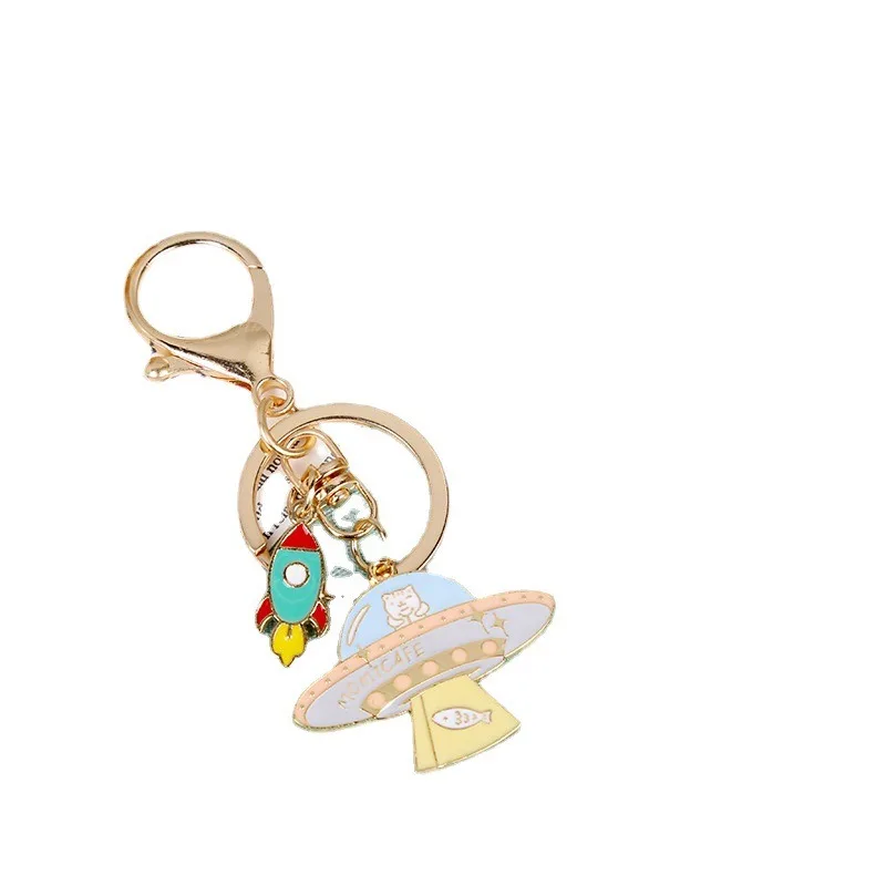 Wholesale Cute Cartoon Students Metal Keychain Bag Car Key Pendant Alloy Universe Starry Sky Rocket Astronaut Keychain