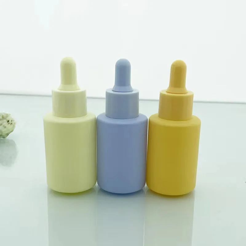 Frosted colorful wholesale cosmetic skincare packaging glass essential oil dropper bottles glass 30ml serum bottle