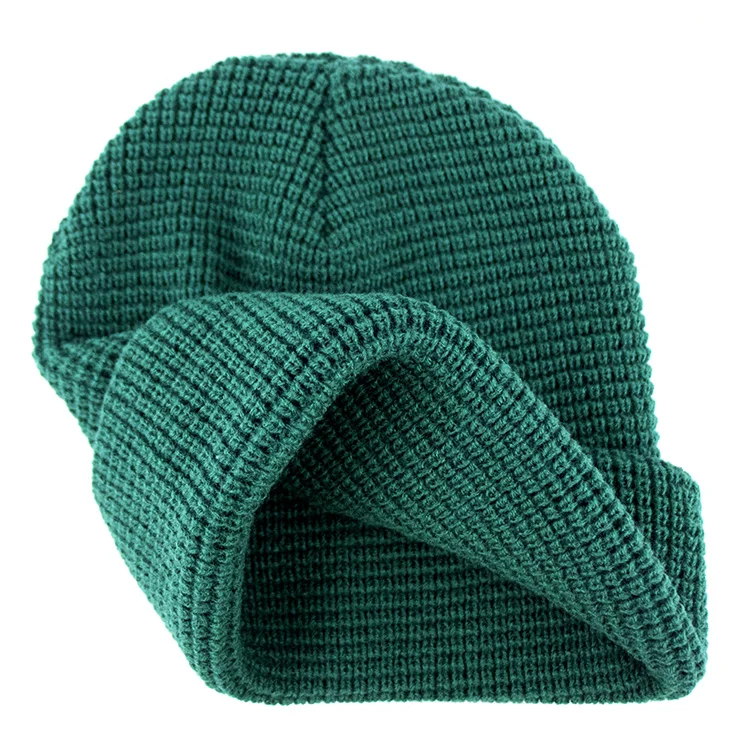 Hengxing solid green color custom pvc rubber patch skull cap soft cuffed winter warm hat waffle knit beanie manufacturer