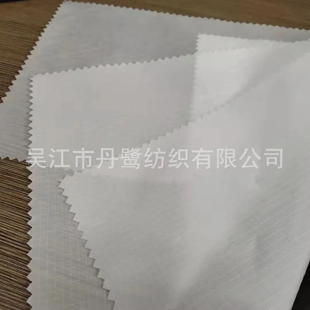 Оптовая продажа водонепроницаемая нейлоновая тафта ripstop горячая Распродажа Серебряная для фотографии/отражающая ткань цена