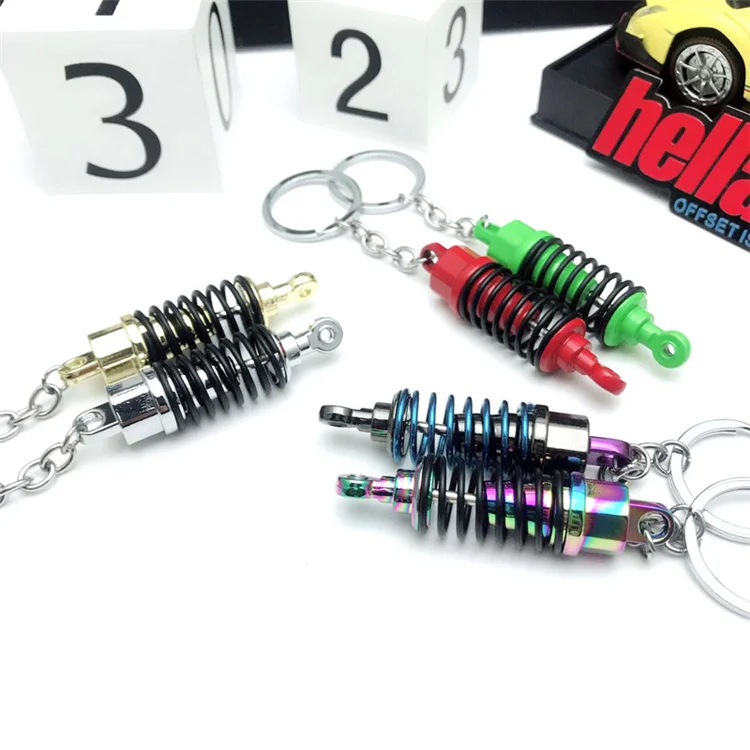 Car keyrings Car Auto Tuning Parts Shock Absorber Keychain Keyring Spring Shock Absorbers Creative Gift (1600431131875)