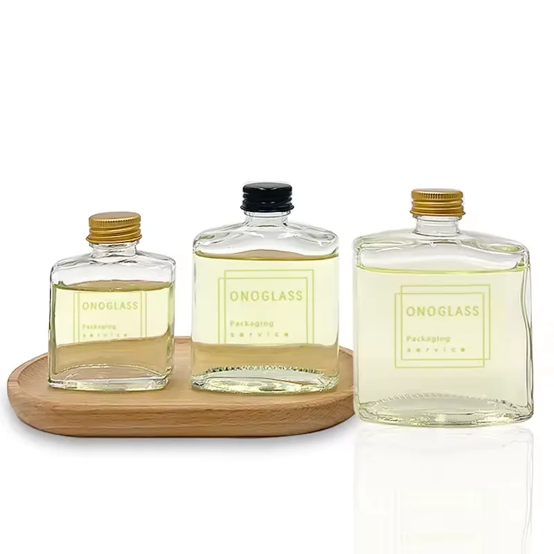 Hot Sale Classic 2 oz 100ml 200ml 250ml Clear Flat Square Glass Liquor Bottle with Gold Cap for Beverages Screen Printed Surface