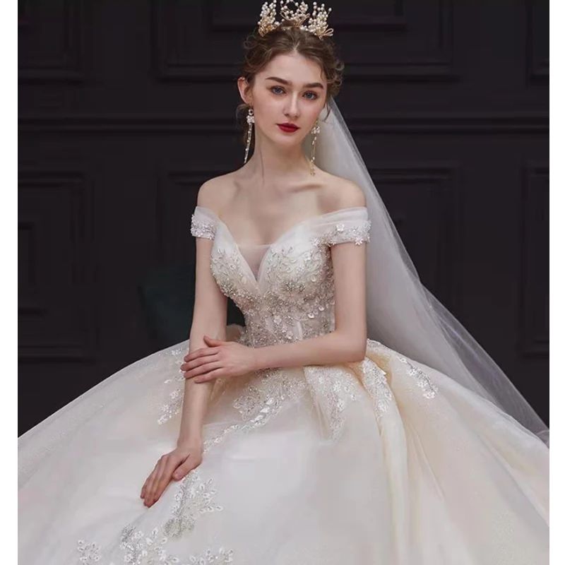 French light luxury long tail wedding dress with low neckline one shoulder with Flowers aesthetic wedding dress