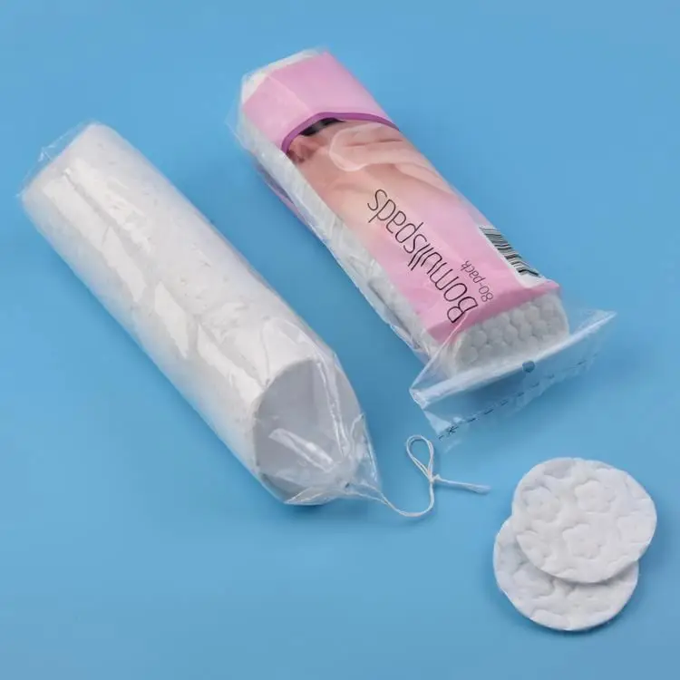 
Cotton wool pads with 58MM 