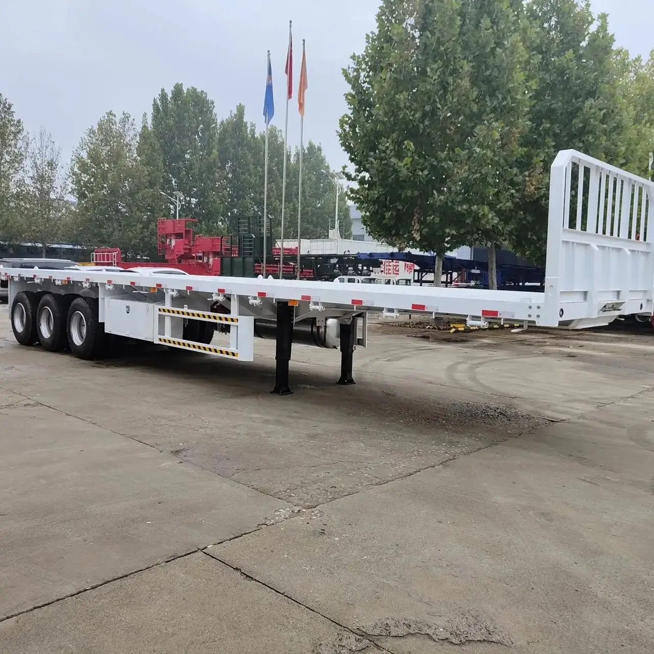 China Factory Lowest price New 3/4 Axle Flatbed Container Heavy Duty Cargo Transport with Front Wall and Lock Semi Trailer