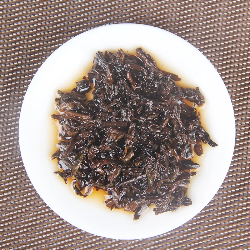 Hot selling Chinese shu puer tea cake 357 gram golden buds royal cake ripe Puerh Yunnan qi zi bing cha OEM order
