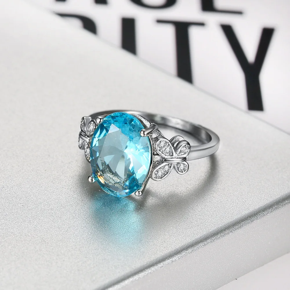 2022 Hot new products sea blue sapphire CZ finger twist infinity ring designs engagement ring or couple ring for woman