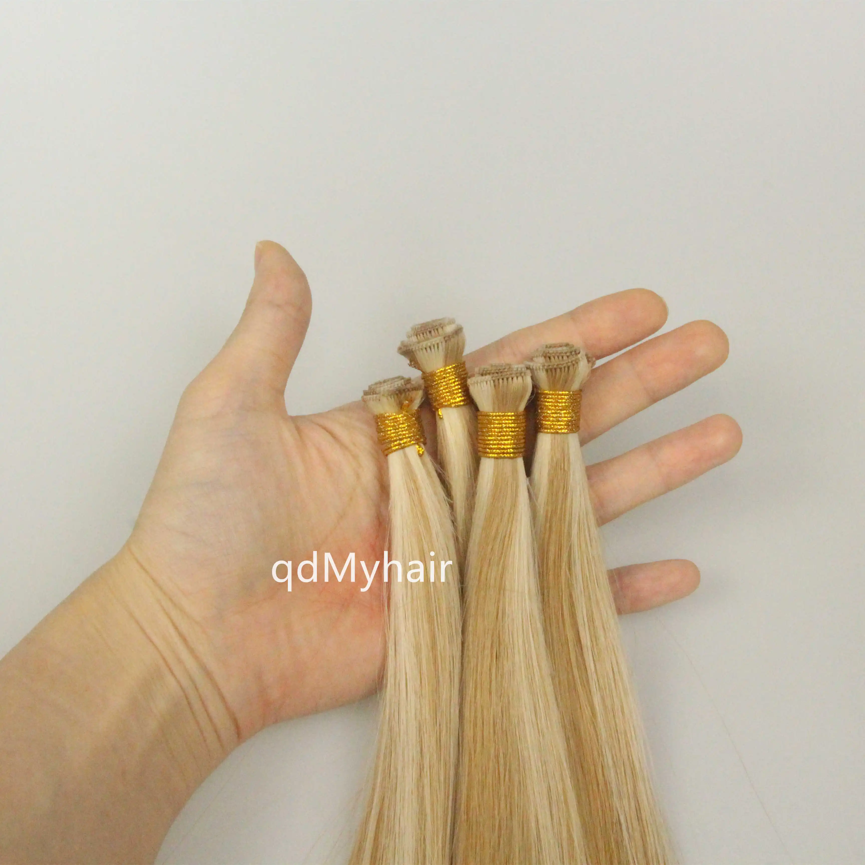 OEM wholesale natural virgin hand tied weft human hair extensions remy peruvian keratin real russian hair hand tied weft hair