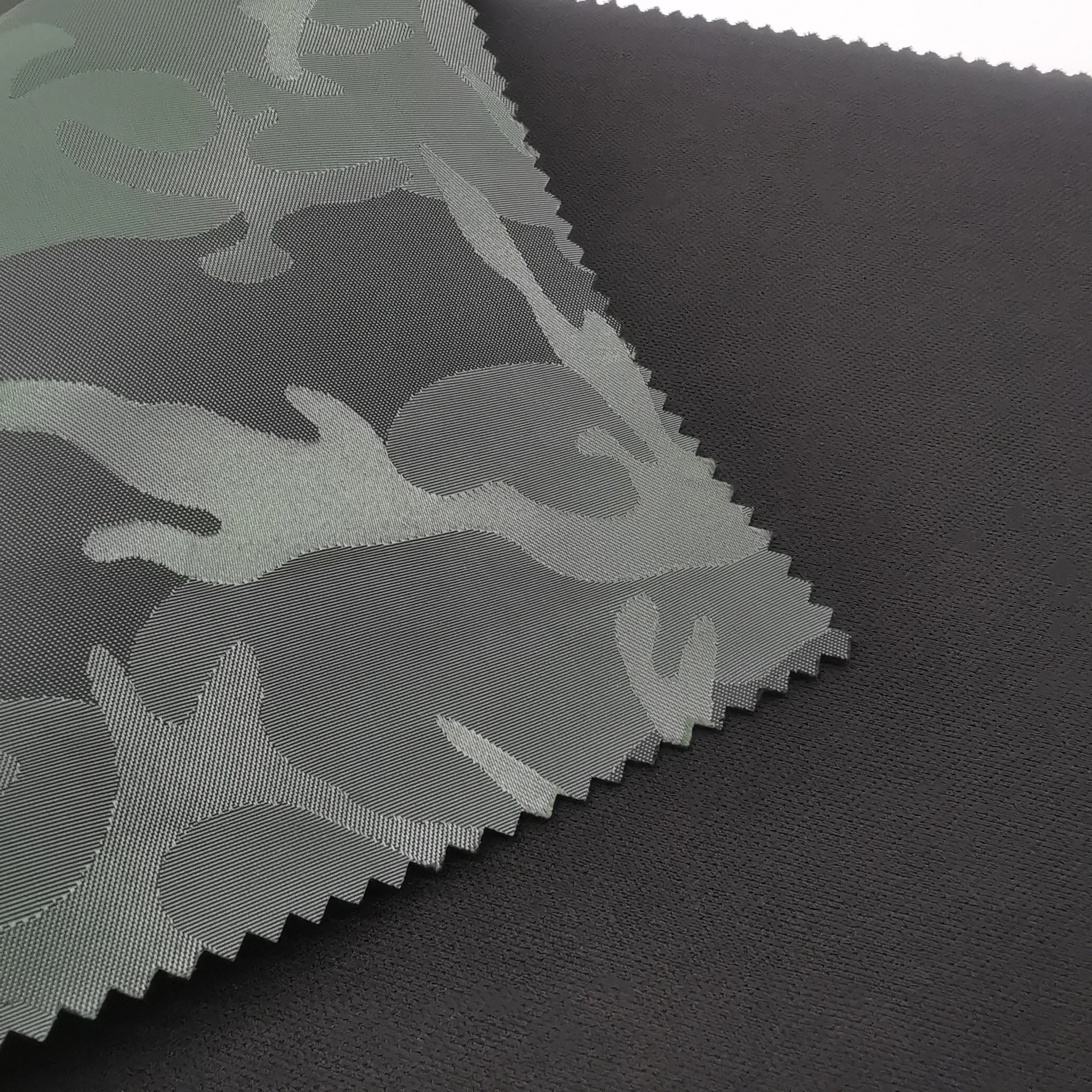 hot-selling camouflage jacquard Oxford fabric bonded knitted fabric with backpack