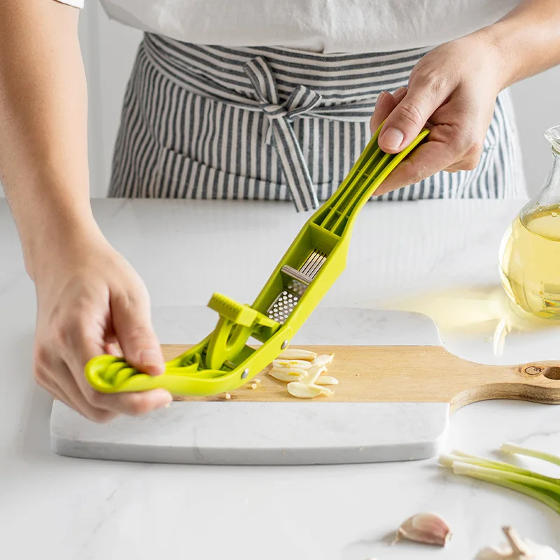 New 2-in-1 Kitchen Garlic Press and Cutter Household Fruit & Vegetable Tools for Pitting Garlic Fillets and Mixers