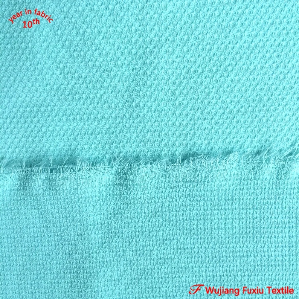 stretch yarn 100 polyester jacquard honeycomb fabric for lady wear