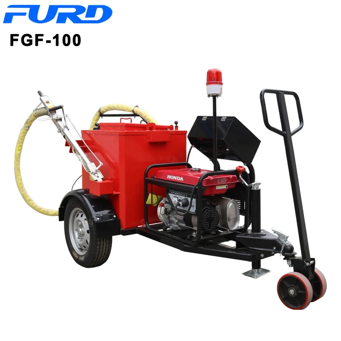 Hot pour sealing machine for asphalt and concrete cracks