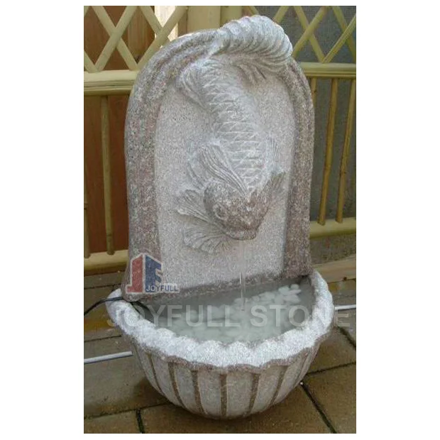 
European Carved Stone Granite Wall Fountain with fish sculpture 